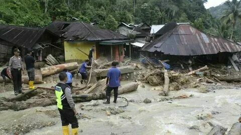Landslides kill over 50 people in Indonesia and East Timor