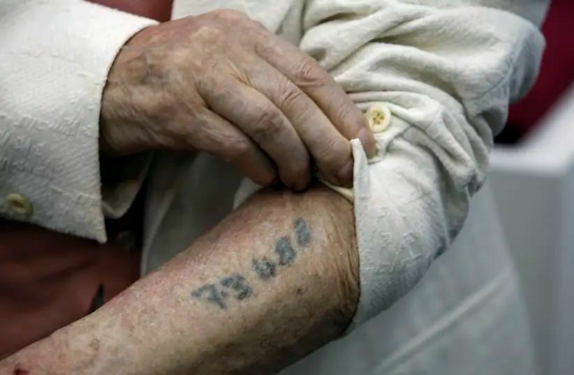 Auschwitz prisoners' stamps put up for auction in Israel