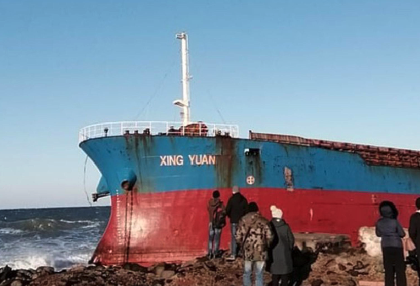 On Sakhalin, the crew of a Chinese dry cargo ship that has run aground is being evacuated