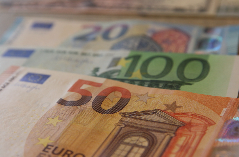 The euro fell below $0.9935 against the dollar for the first time in 20 years