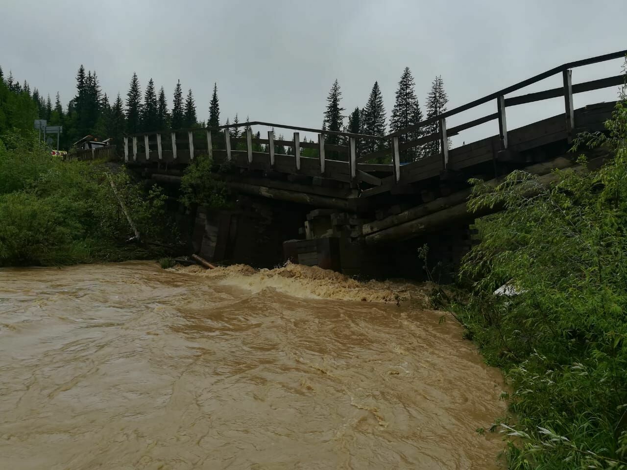 In the Krasnoyarsk Territory, a road bridge collapsed as a result of prolonged rains